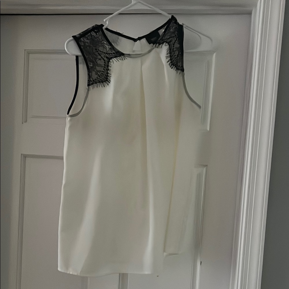 Elegant Cream Sleeveless Top with Black Lace